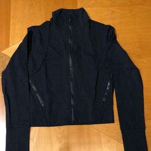 Yoga/ workout jacket. 80% nylon 20% spandex.